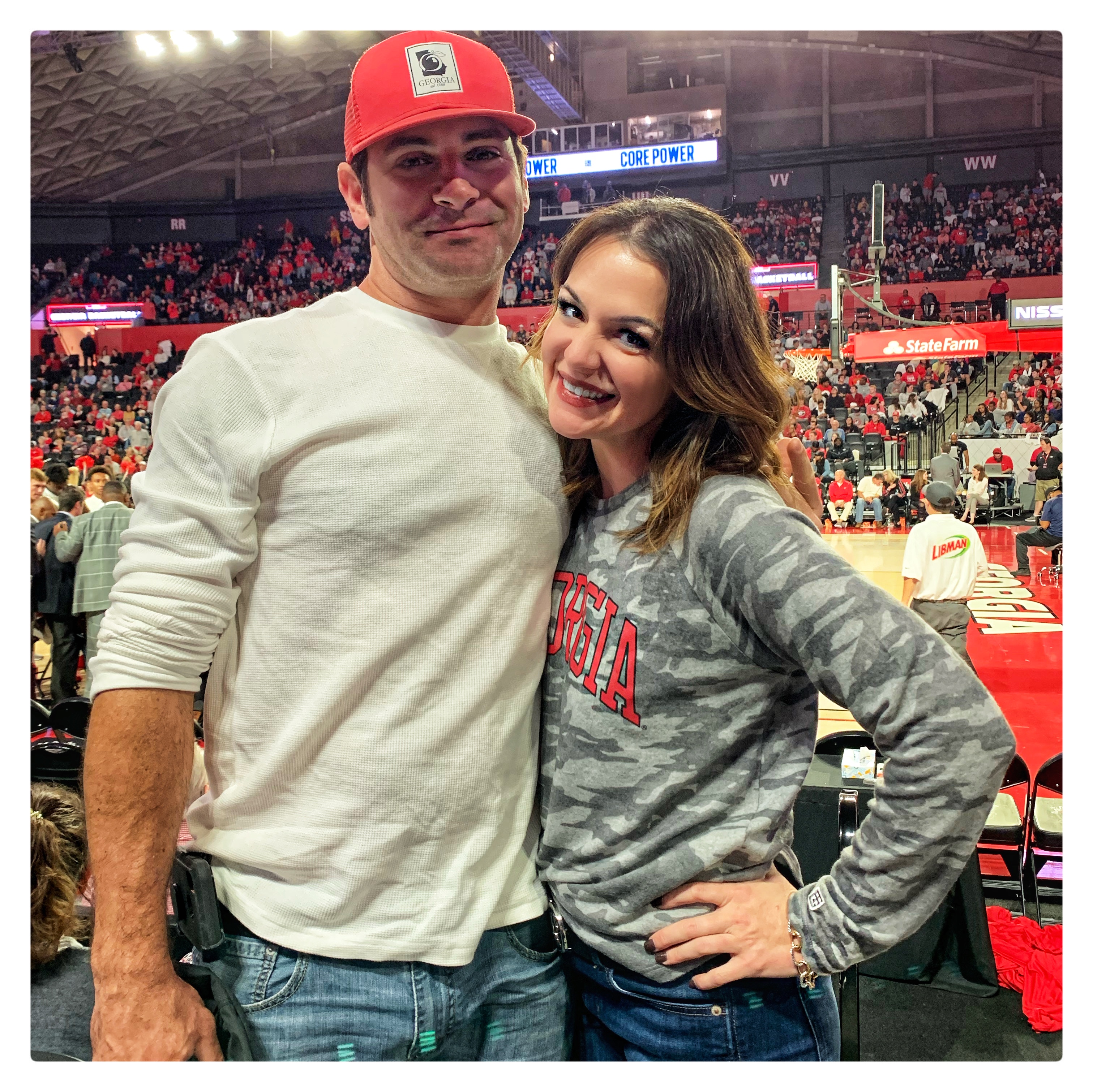 Stephanie with a friend at a UGA basketball game